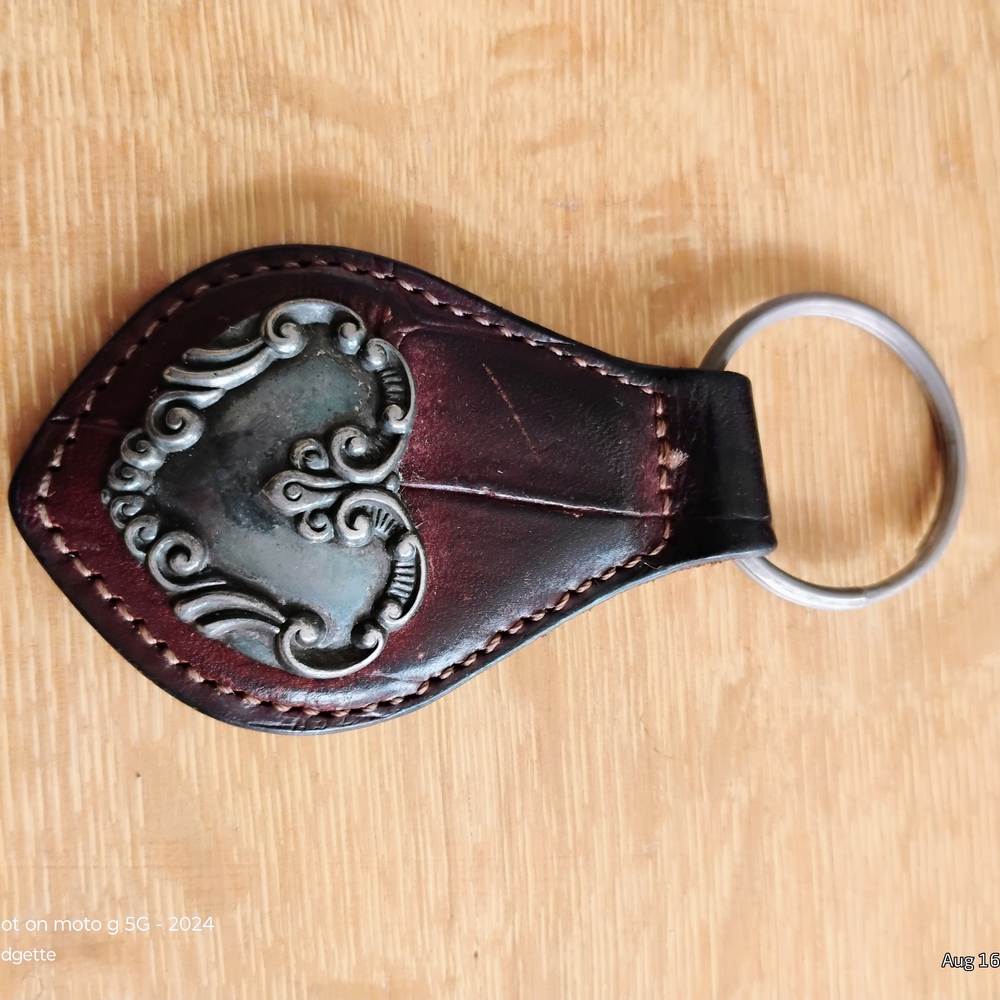 Elegant Brown Leather Keychain with Silver Accent
